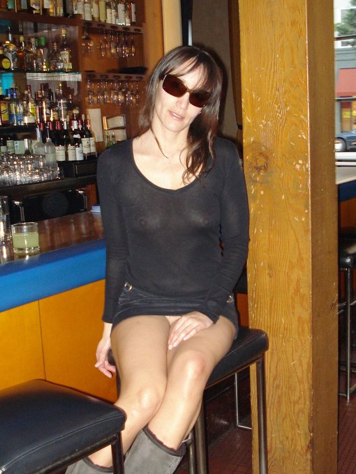 Hot Lady in Seethrough Clothes Flashing Pussy in Public Bar